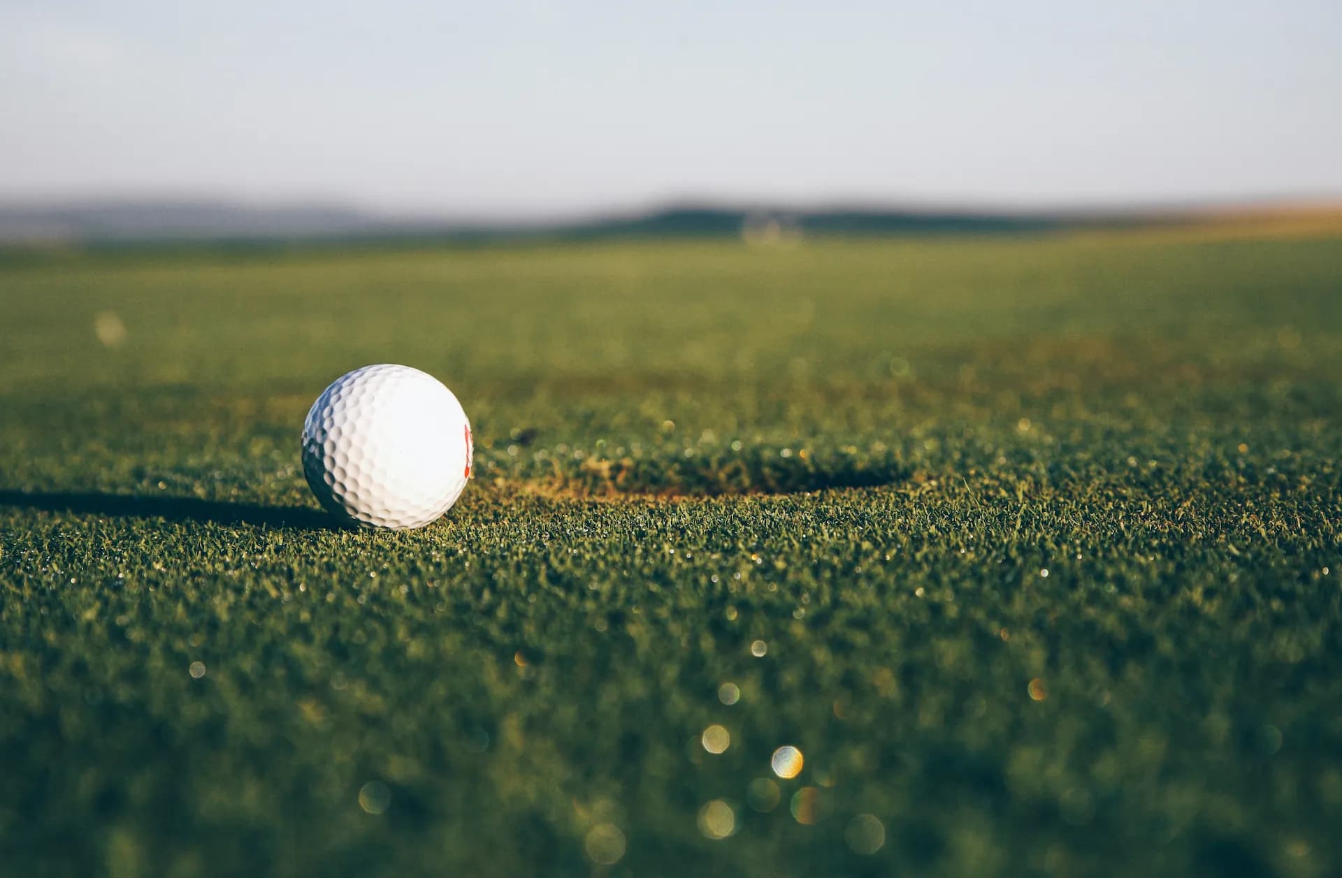 Ball on the lip of the cup